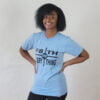 woman in light blue "f8th over everything" tee
