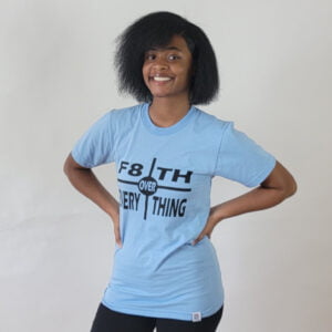 woman in light blue "f8th over everything" tee